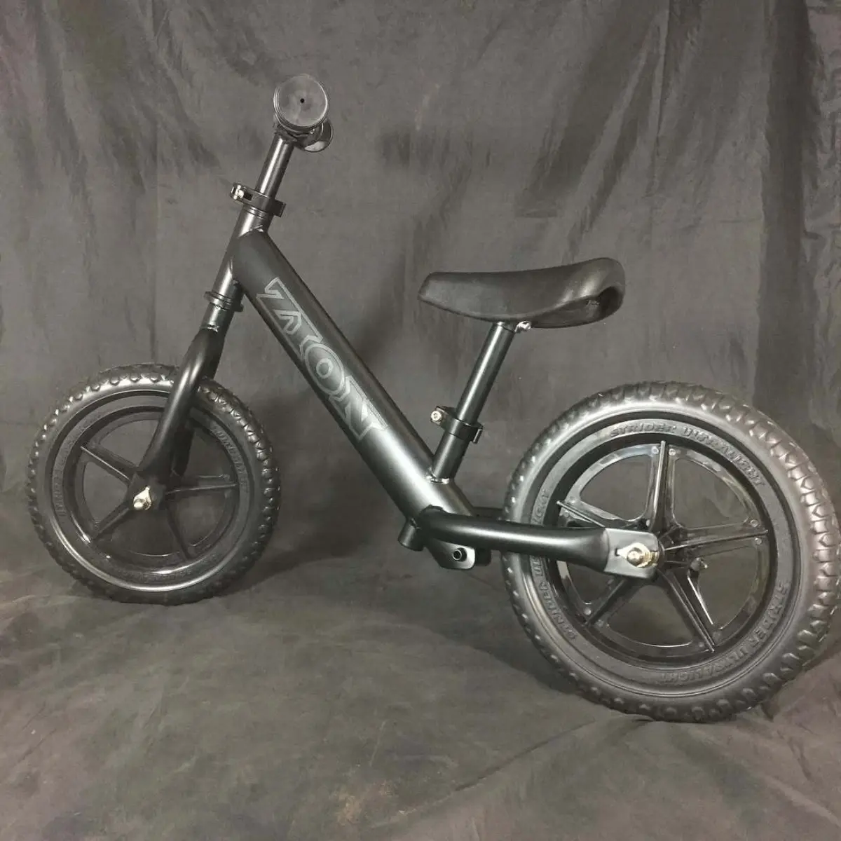 This kids going to have the coolest push bike on the block! All powder coat, denim black with logo in a metallic gunmetal