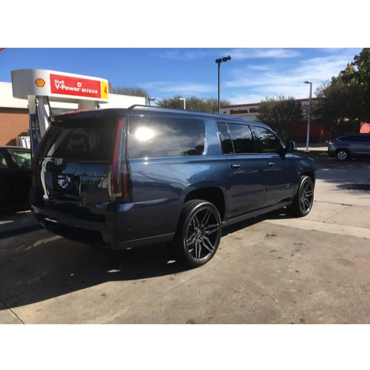 24” Dub wheels refinished in a dark metallic gunmetal