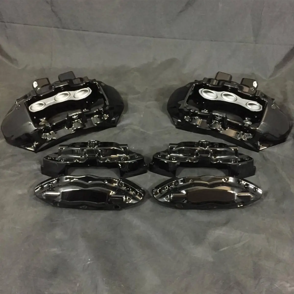 Corvette brake calipers refinished in wet black