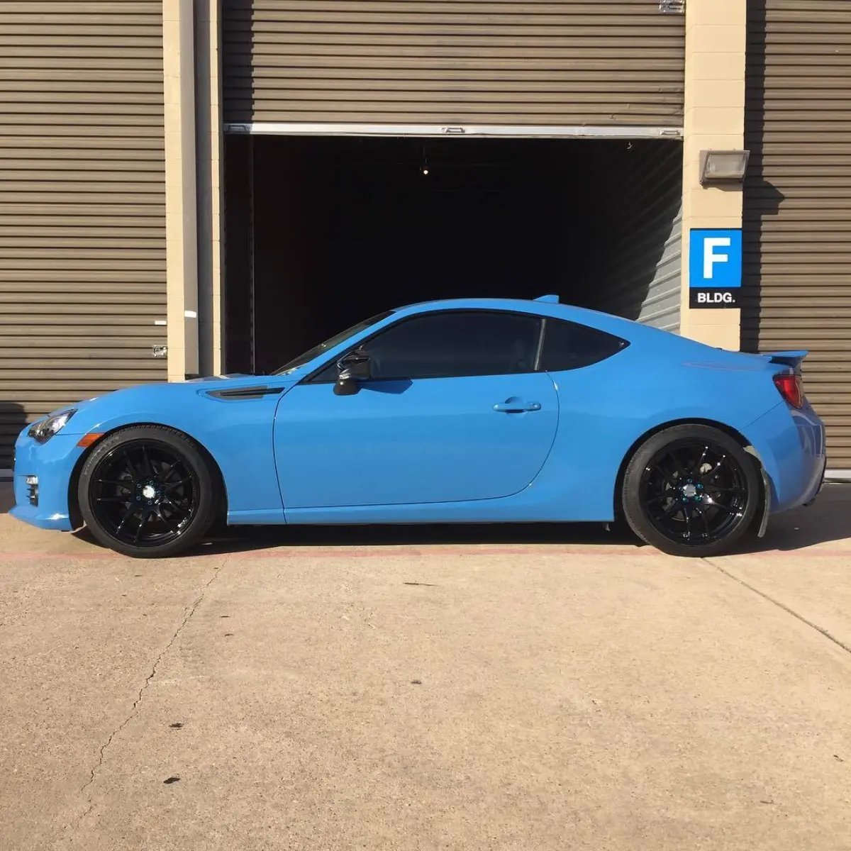 Freshly powder coated wet black wheels for a Subaru BRZ