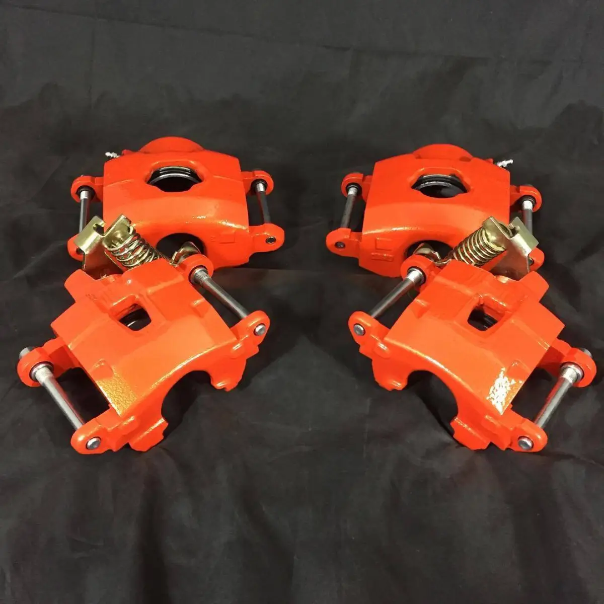 Brake calipers powder coated metallic orange. As always, we disassemble and rebuild to ensure proper function!
