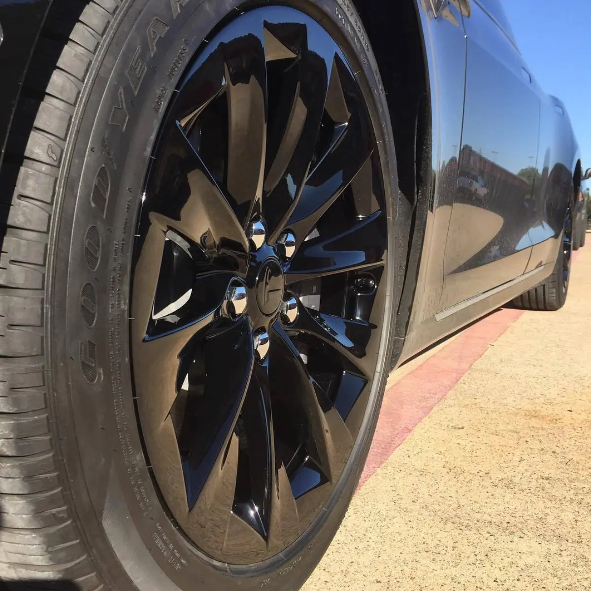 2017 Tesla Model S wheels powder coated wet black. Center caps, tpms nuts, and wheel weights to match