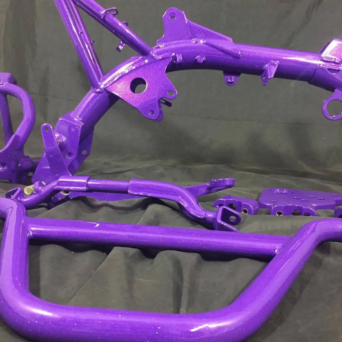 This is is going to be one sweet Honda CRF50 build! Crimson purple and chameleon violet with City Lights accents