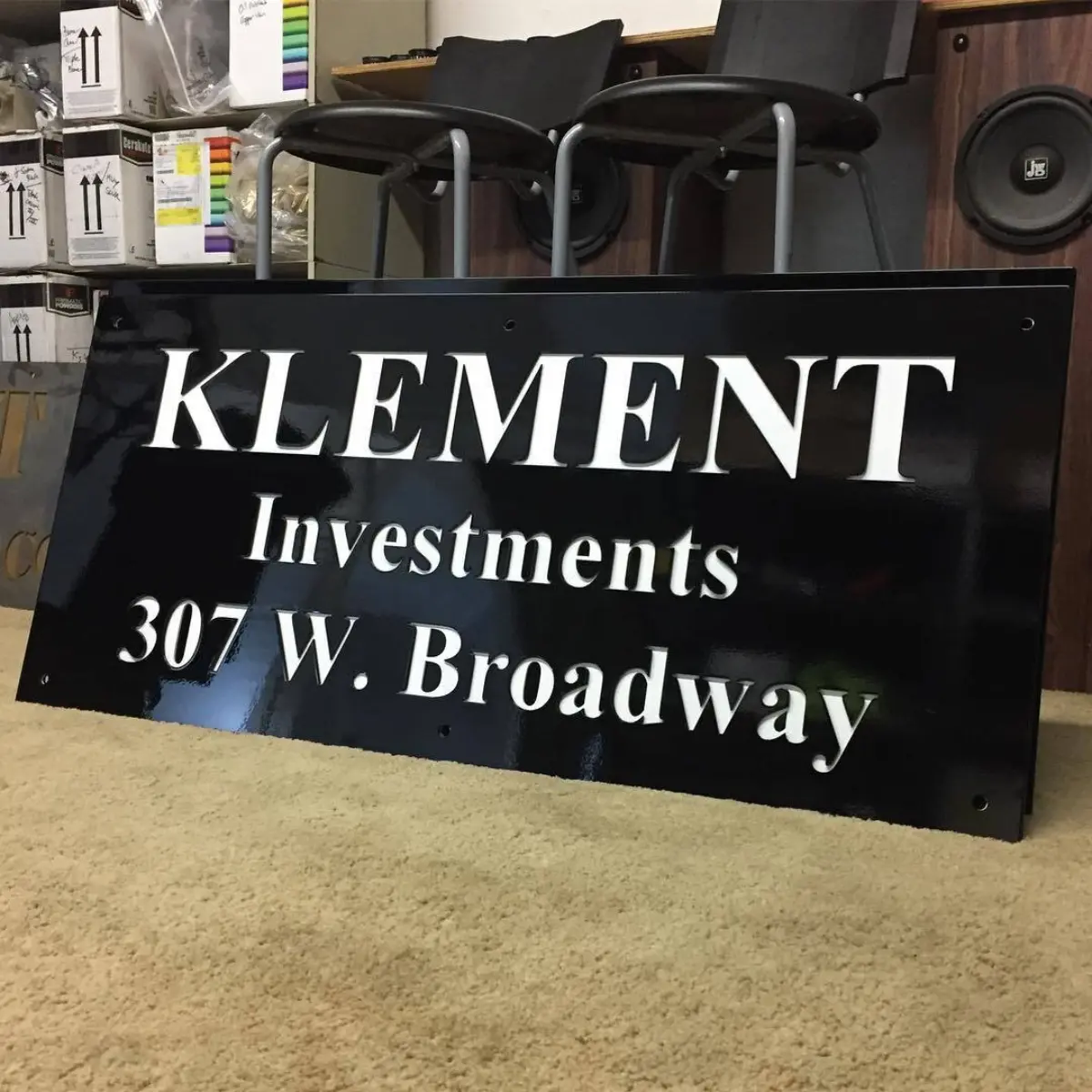 3-Layer steel water jet cut sign. Sandblasted, zinc primer, white, black, and clear coat