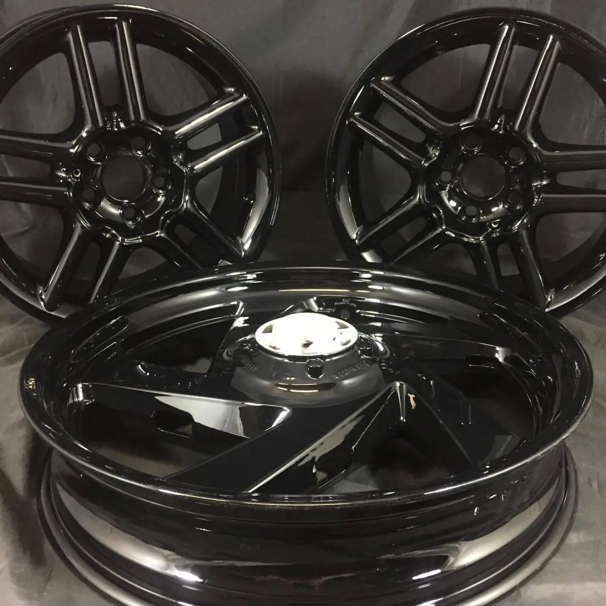 Wet Black with High Gloss Clear on a set of Gold Wing trike wheels
