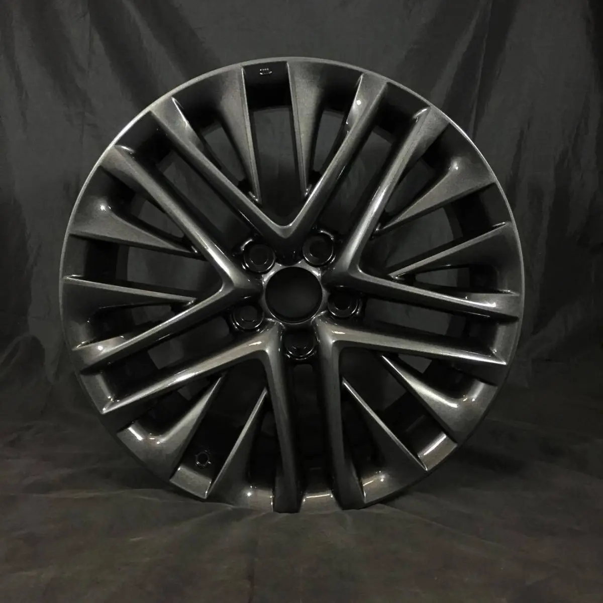 Lexus E-350 wheels powder coated in a dark gun metal with clear