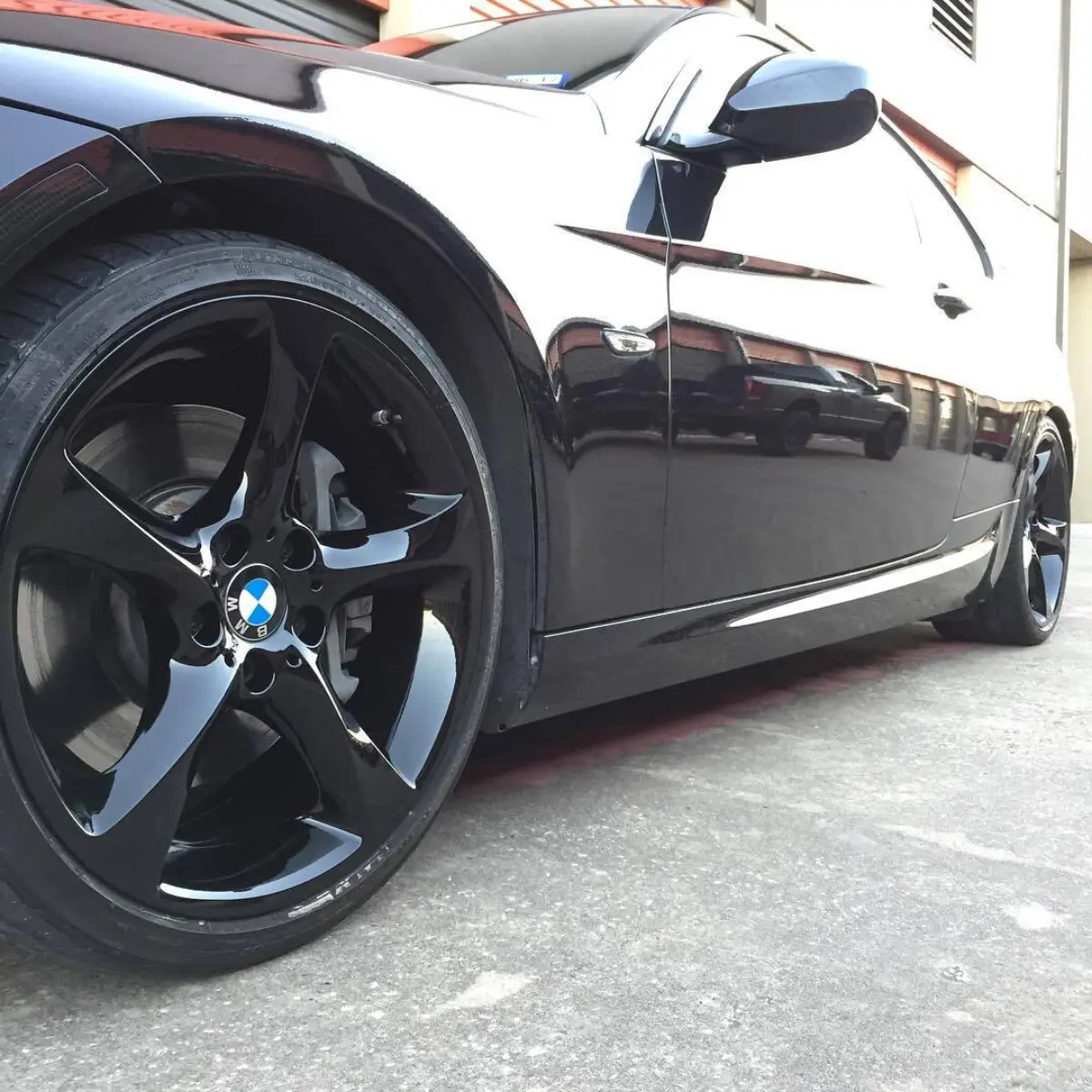 BMW 355i with Wet Black powder coated wheels
