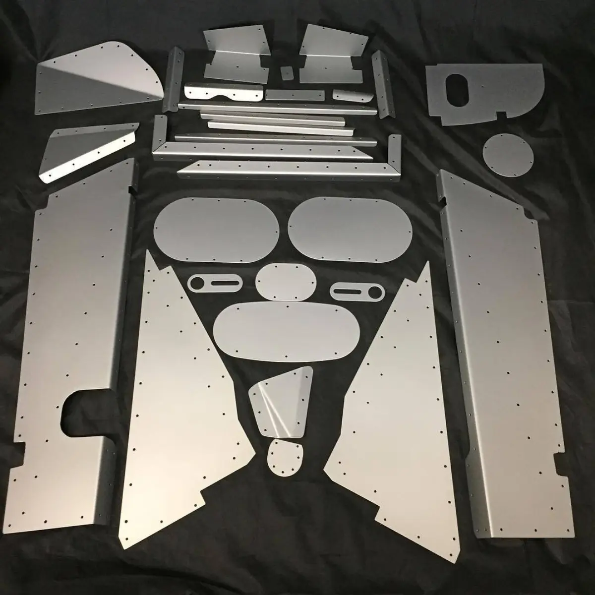 Custom water jet cut panels in Kromezone and Casper Clear