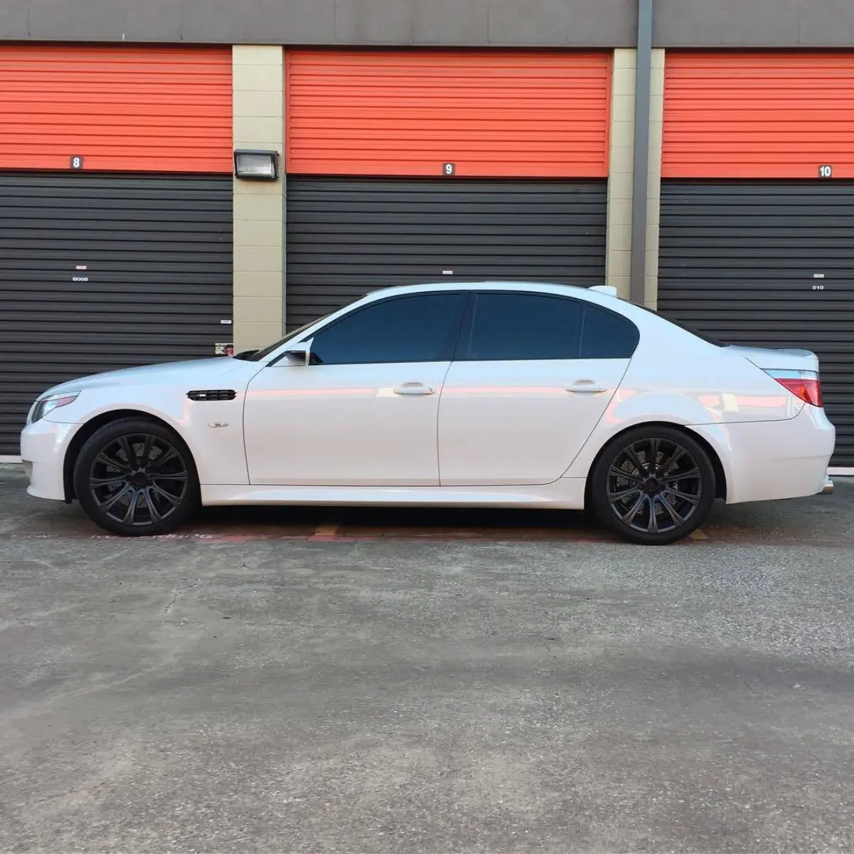 BMW M5 wheels refinished in a dark satin gun metal