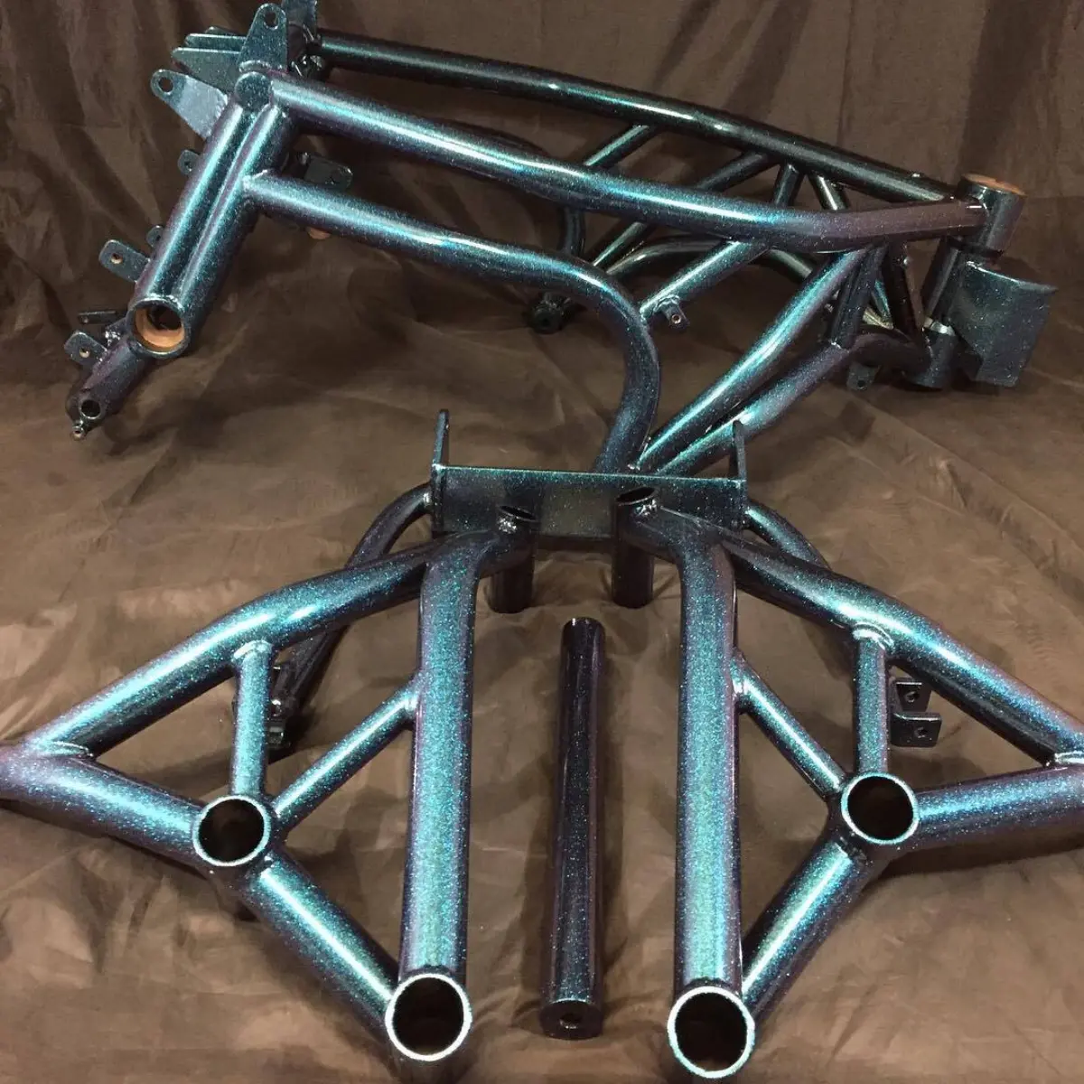 Kawasaki 636 custom Badass frame and Impaktech cage in Chameleon Teal