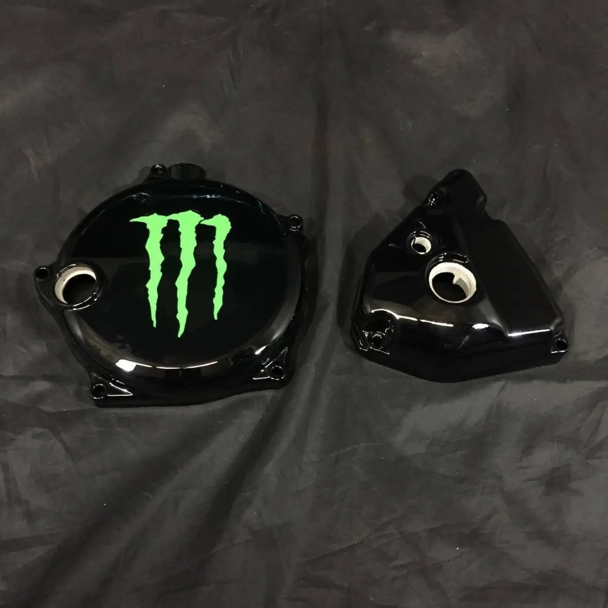Custom engine covers for a Kawasaki KX250. Monster logo in powder coat! Thanks @iconoklastt!