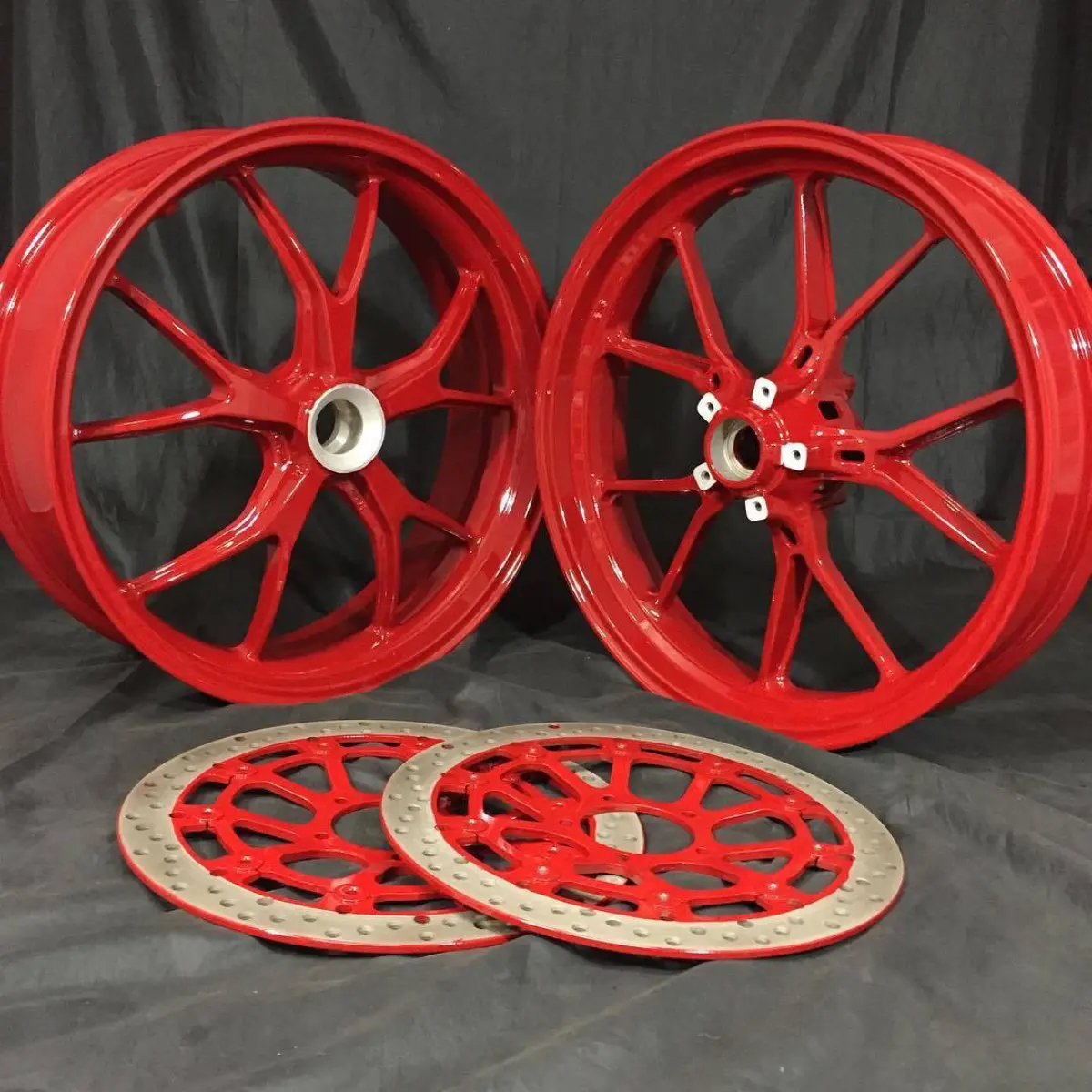 Ducati wheels and rotors in Bellrose Red and Clear Vision
