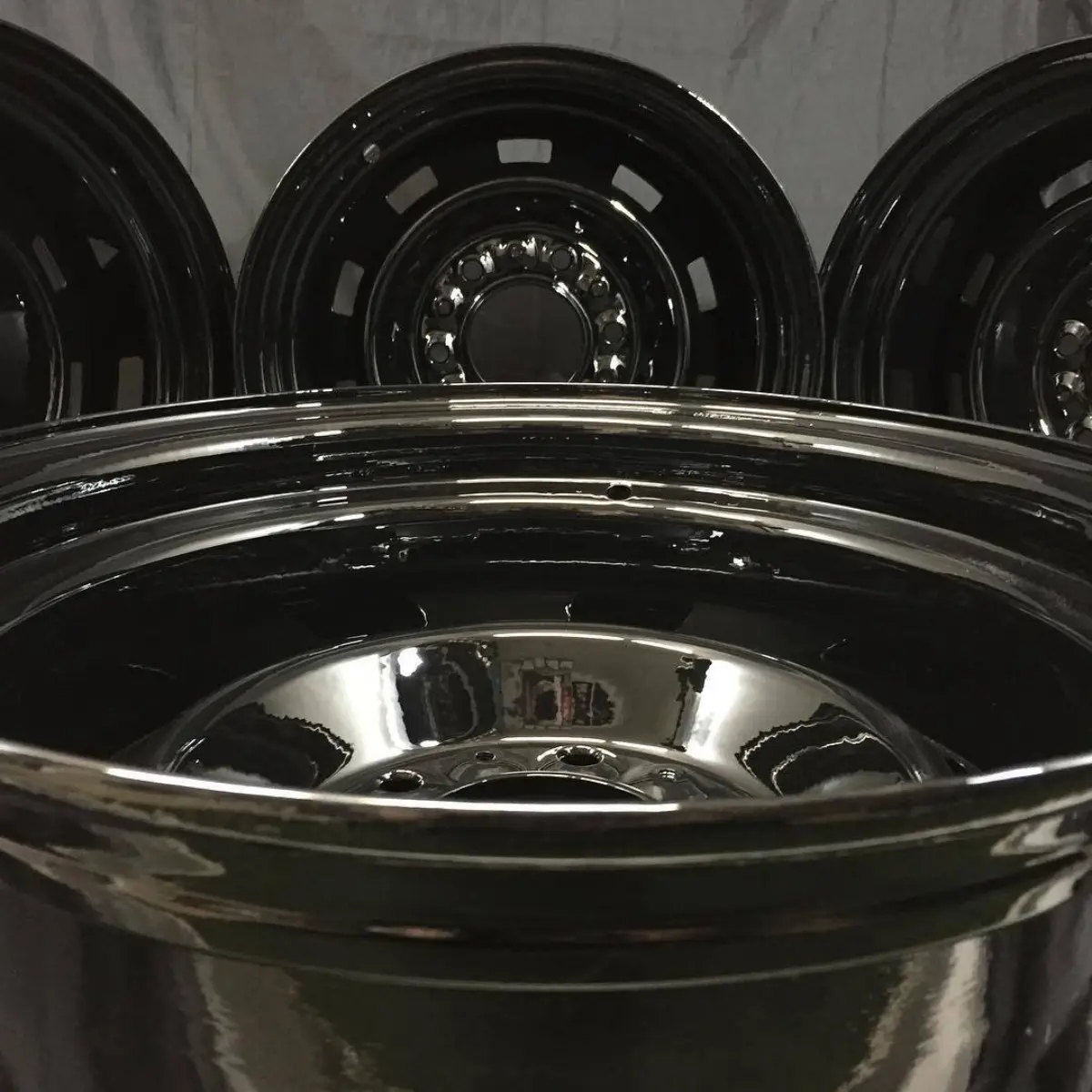 Steel rally wheels in zinc primer and wet black