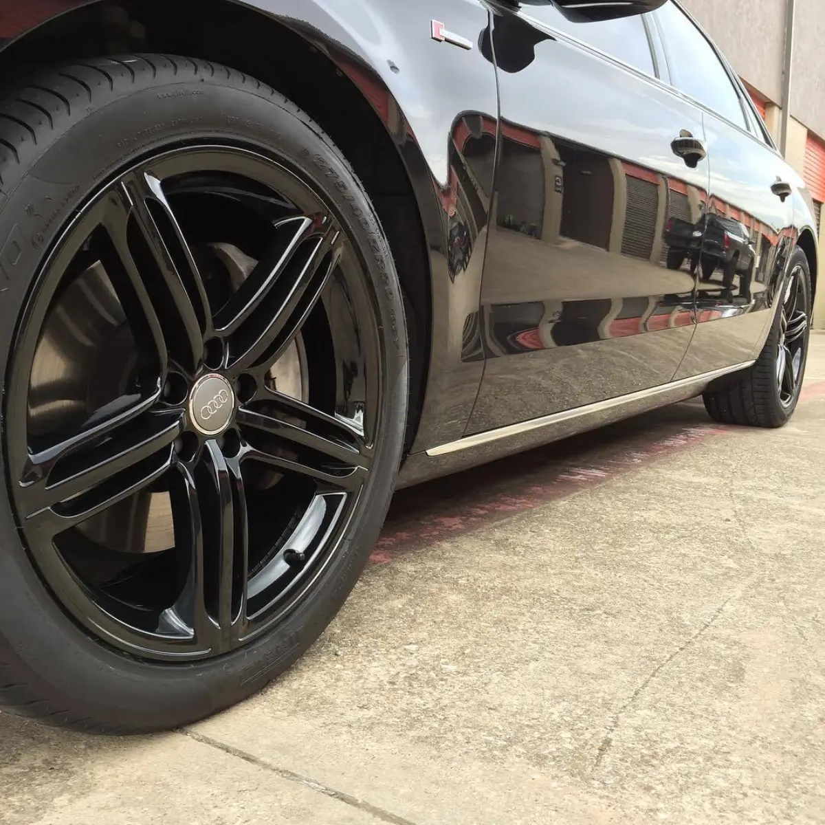 Audi A8 with Wet Black wheels