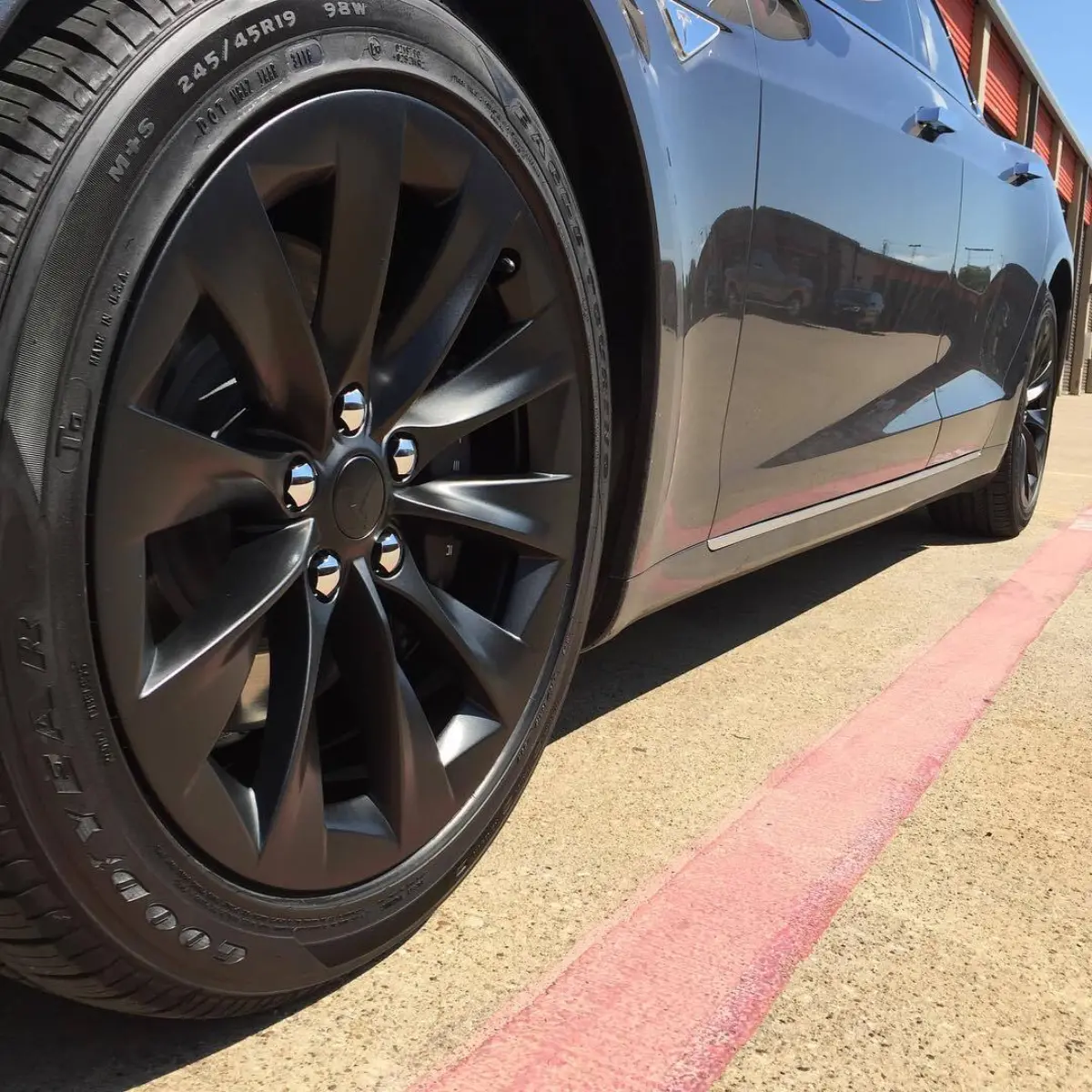 Did you know Tesla uses their logo in the designs of their wheels? Can you find it? 2016 Tesla 75D with Matte Black wheels