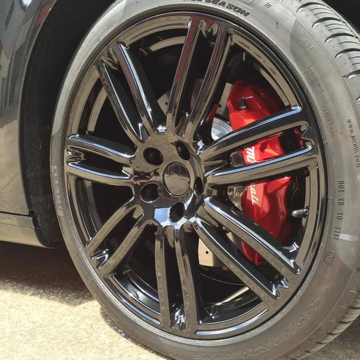 2016 Maserati Ghibli with Wet Black wheels, matching center caps, wheel weights and TPMS nuts