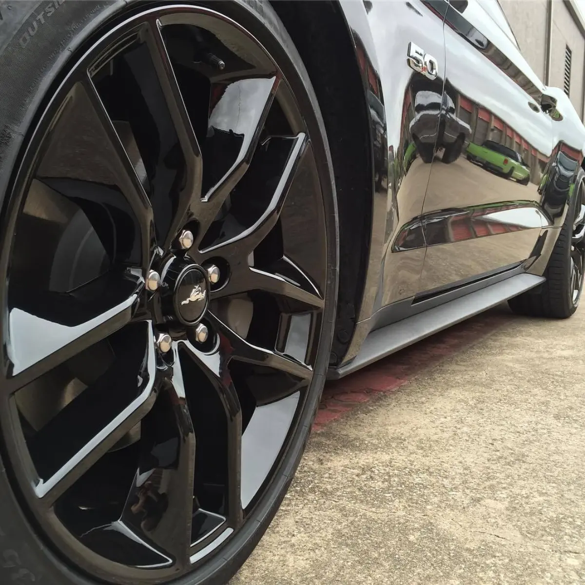 2016 Ford Mustang wheels powder coated in Wet Black