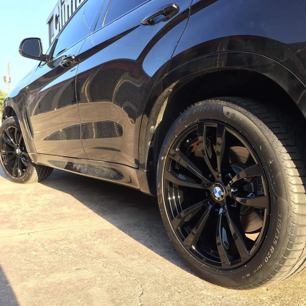 BMW X6 with Wet Black rims