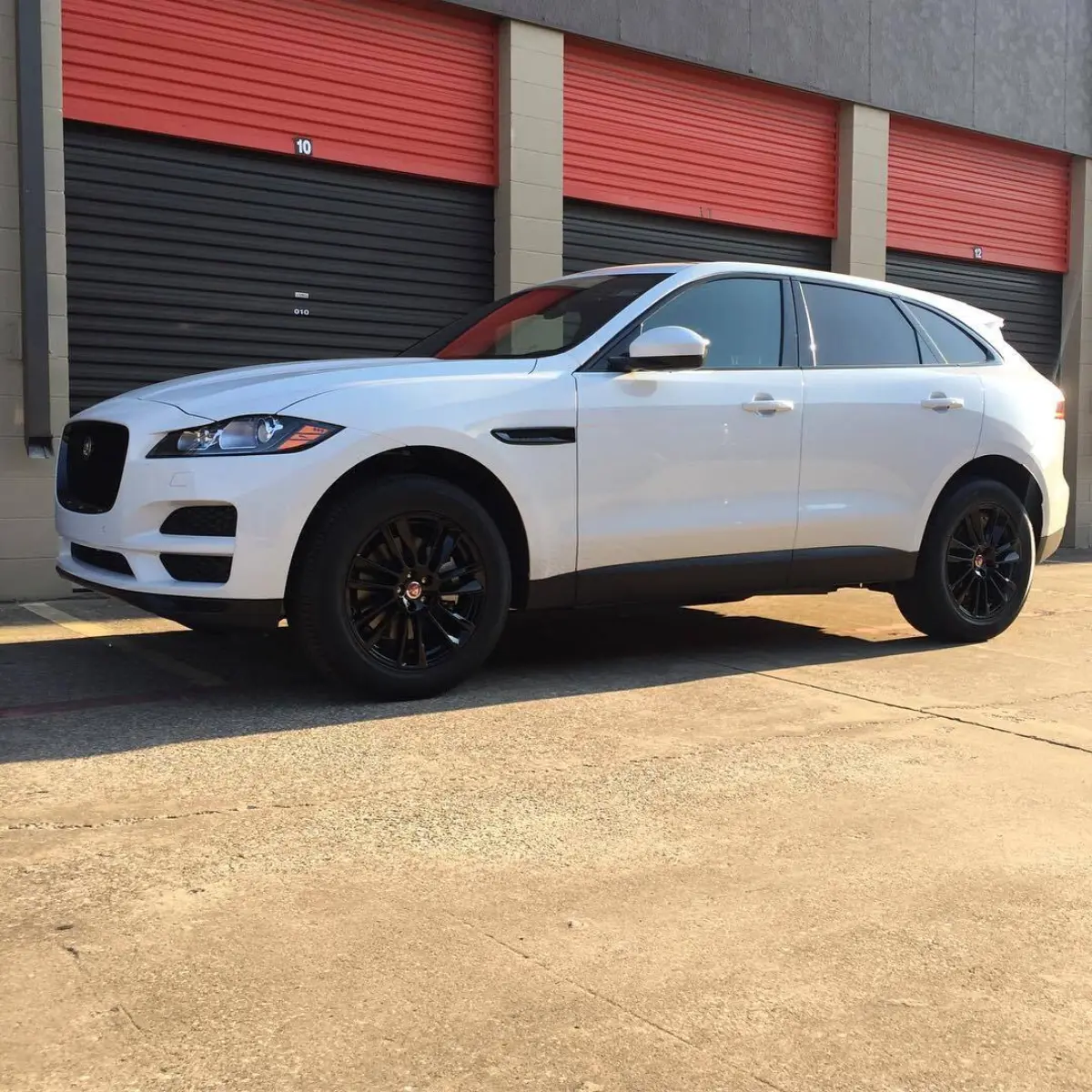 Jaguar F-Pace with Wet Black rims