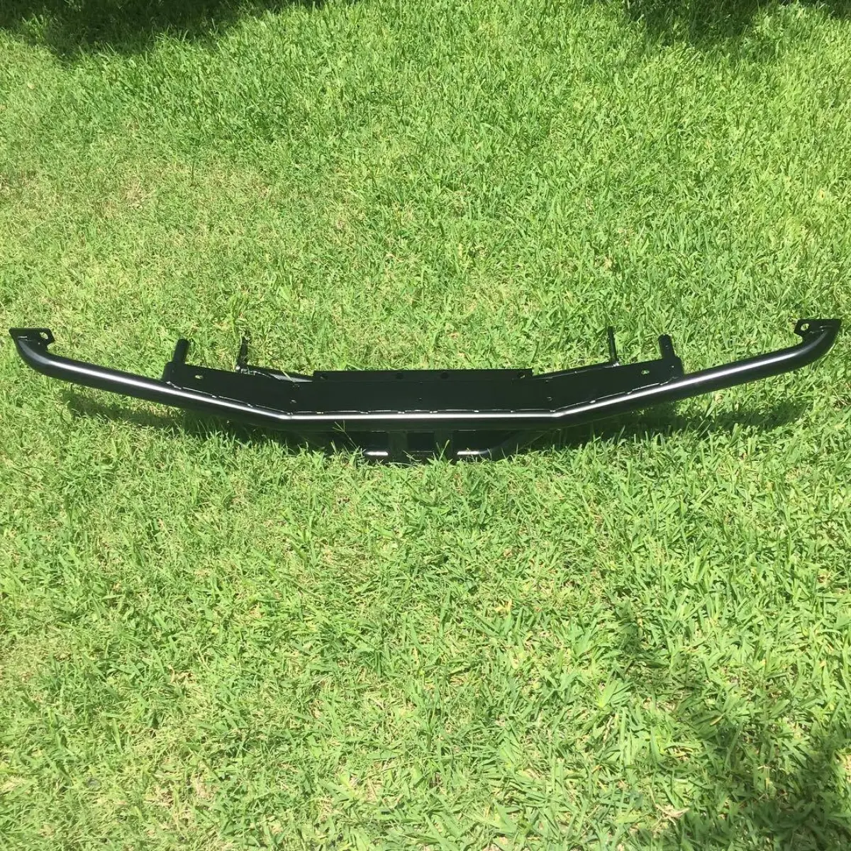 Rear step bumper in PacCar Semi-Gloss Black