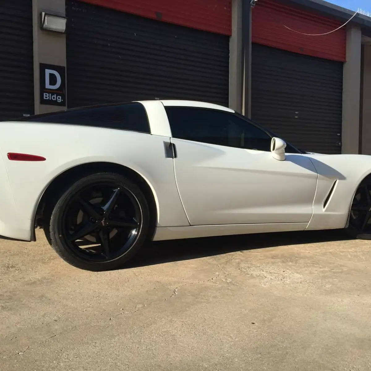 2013 Chevrolet Corvette with Wet Black rims. Matching black center caps, tpms nuts, and black wheel weights