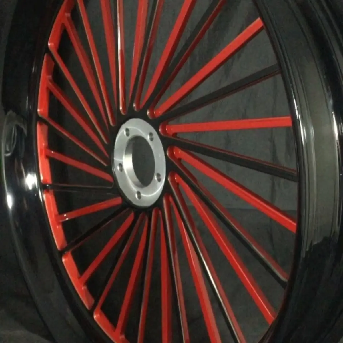 Two-tone red and black on a 3D machined FTD Customs Harley wheel