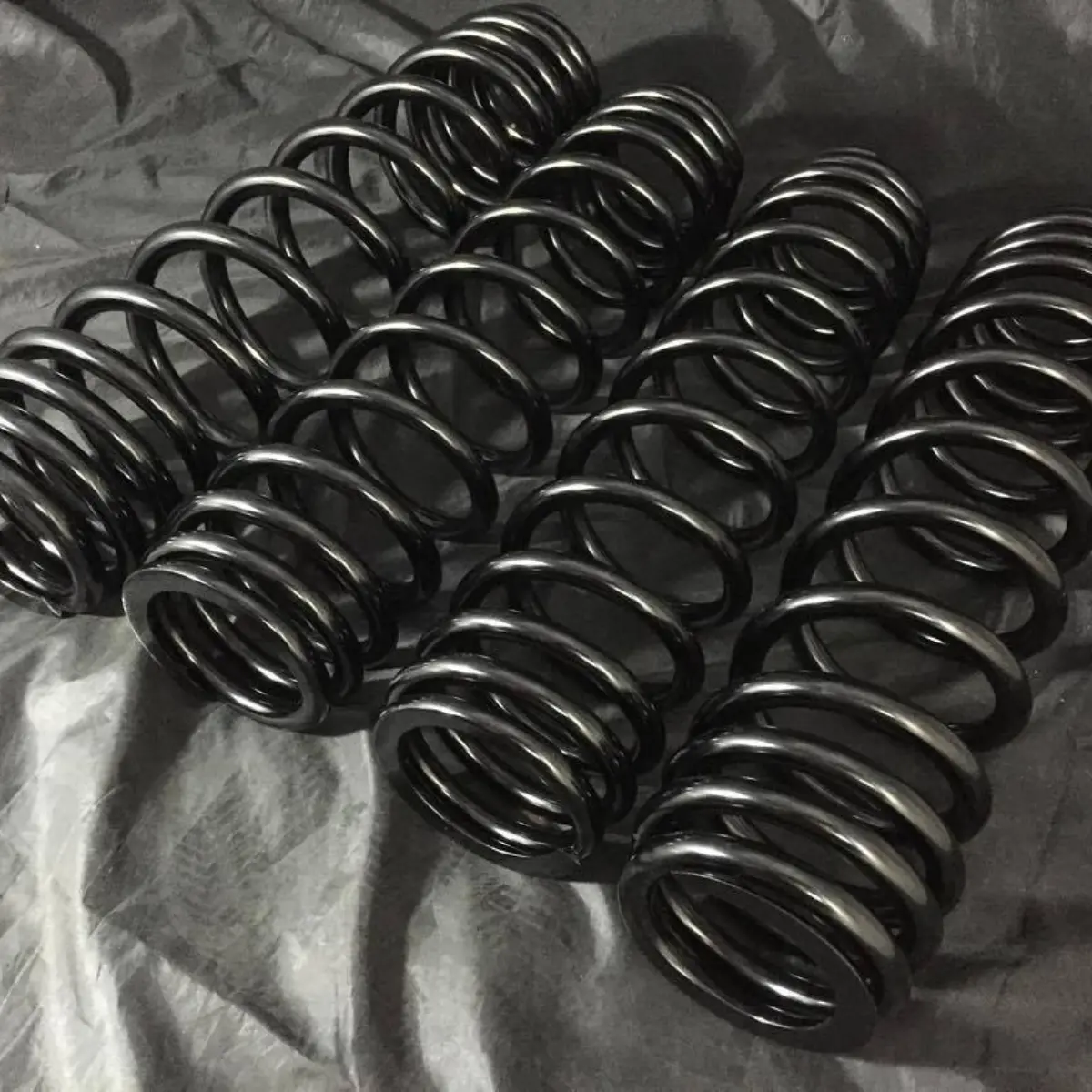 Side by side suspension springs in Pac Car Black