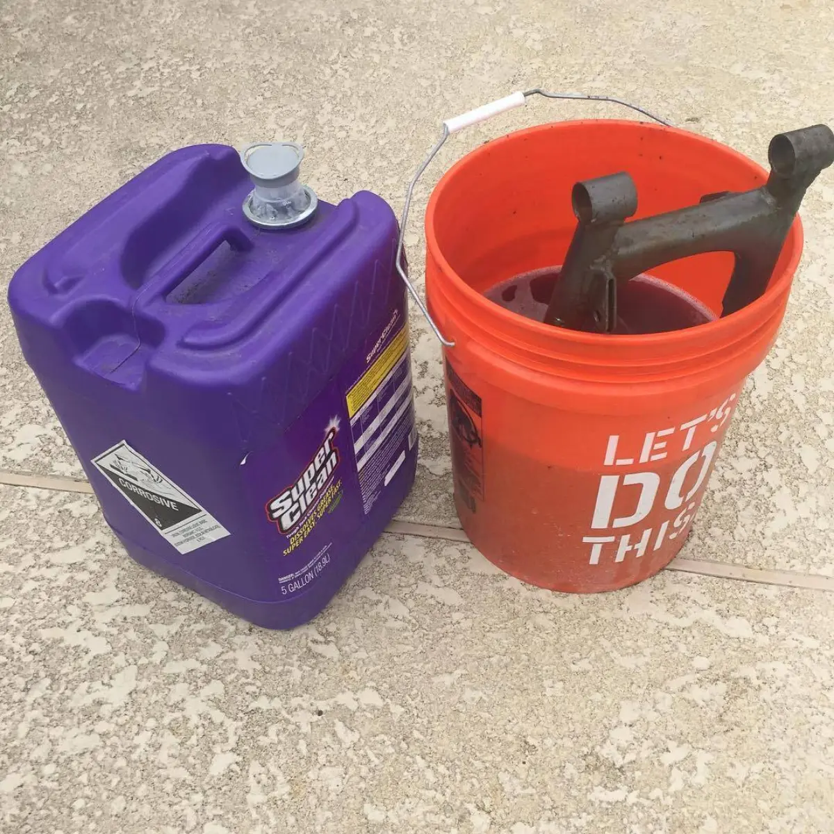 Degreasing a dirt bike swing arm before stripping and blasting