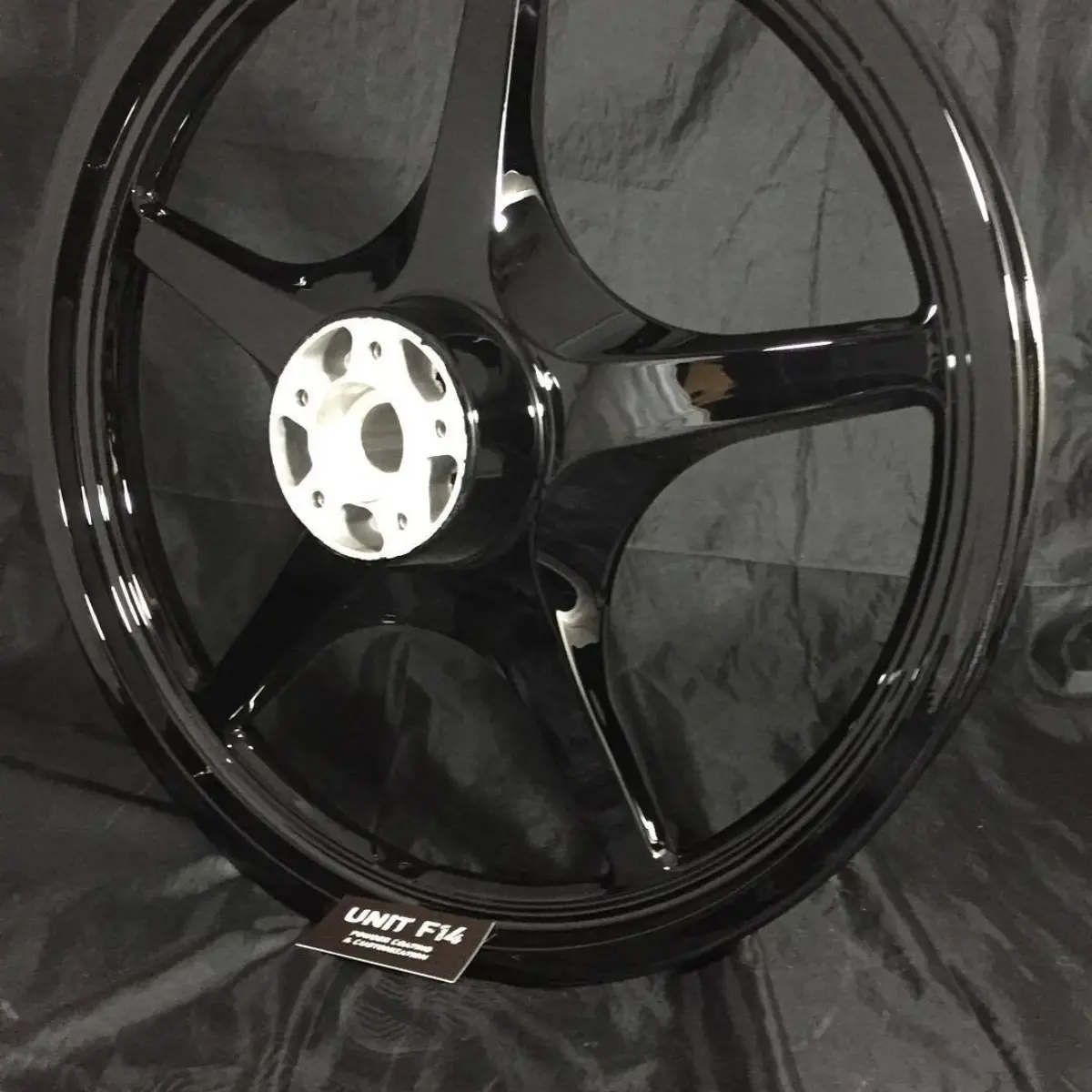 Harley wheel in wet black