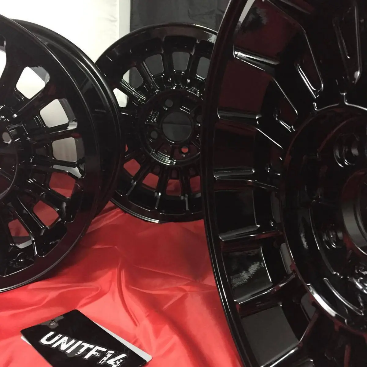 Set of old 15" mustang rims powder coated wet black