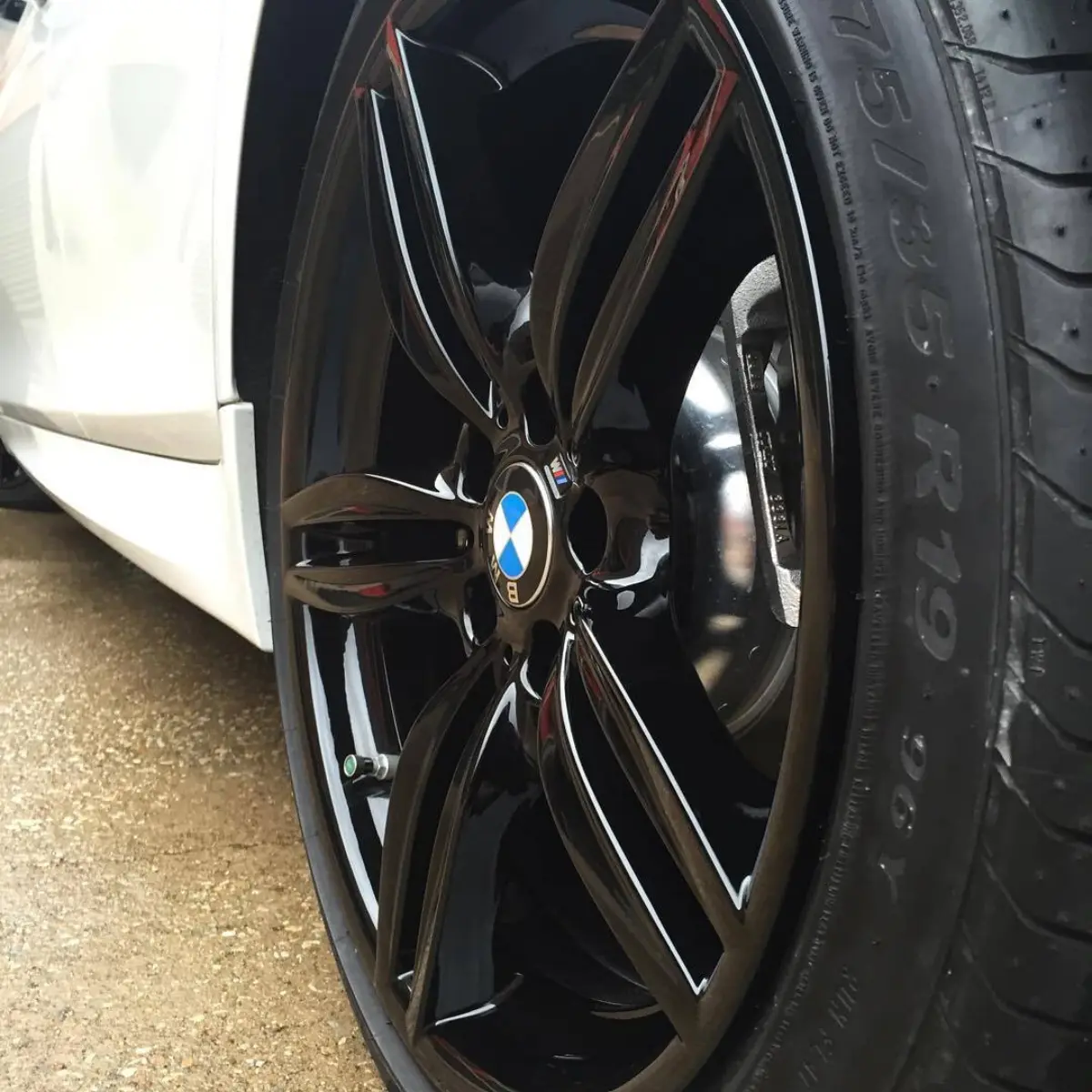 2015 BMW 550i M5 with wet black wheels