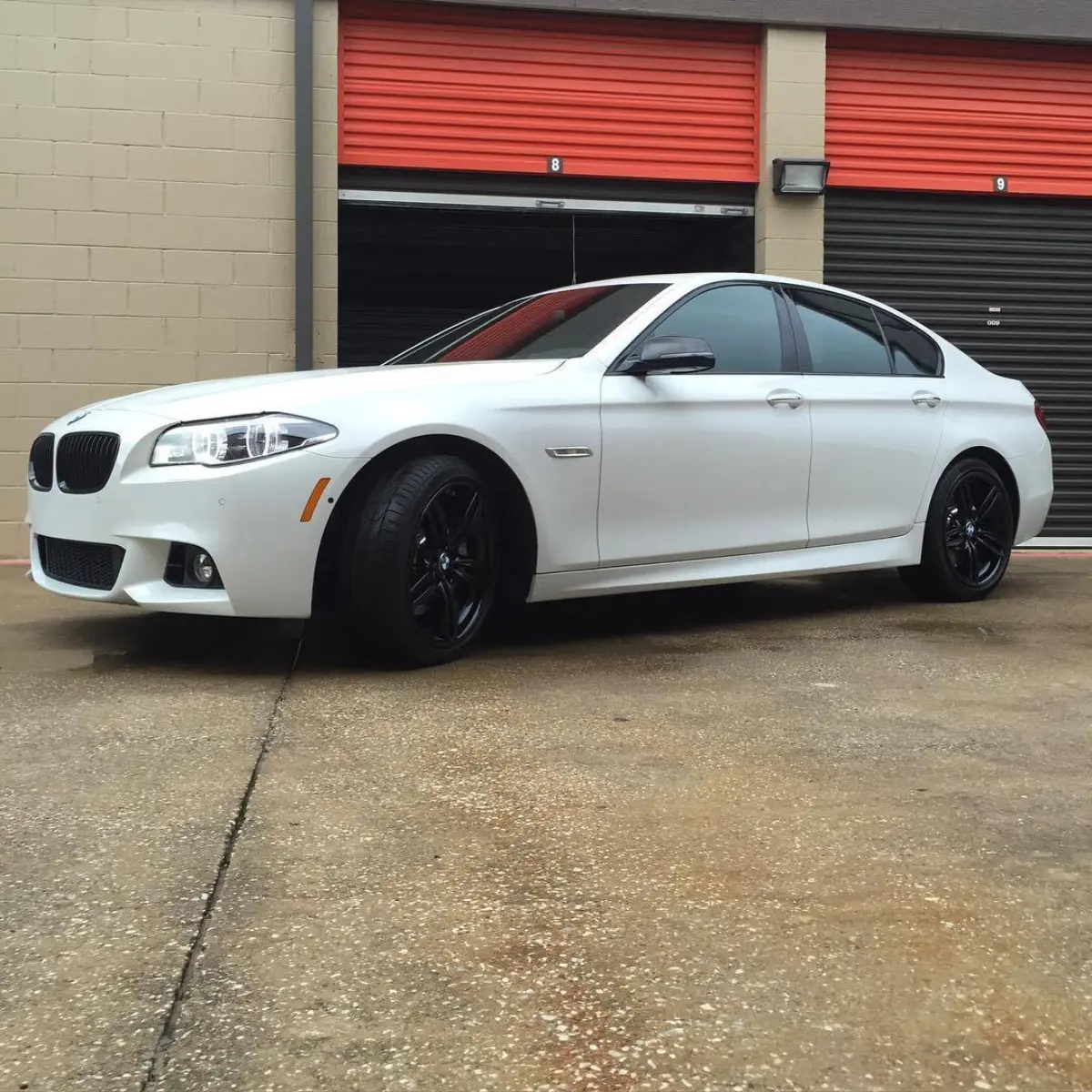 2015 BMW 550i M5 with wet black wheels