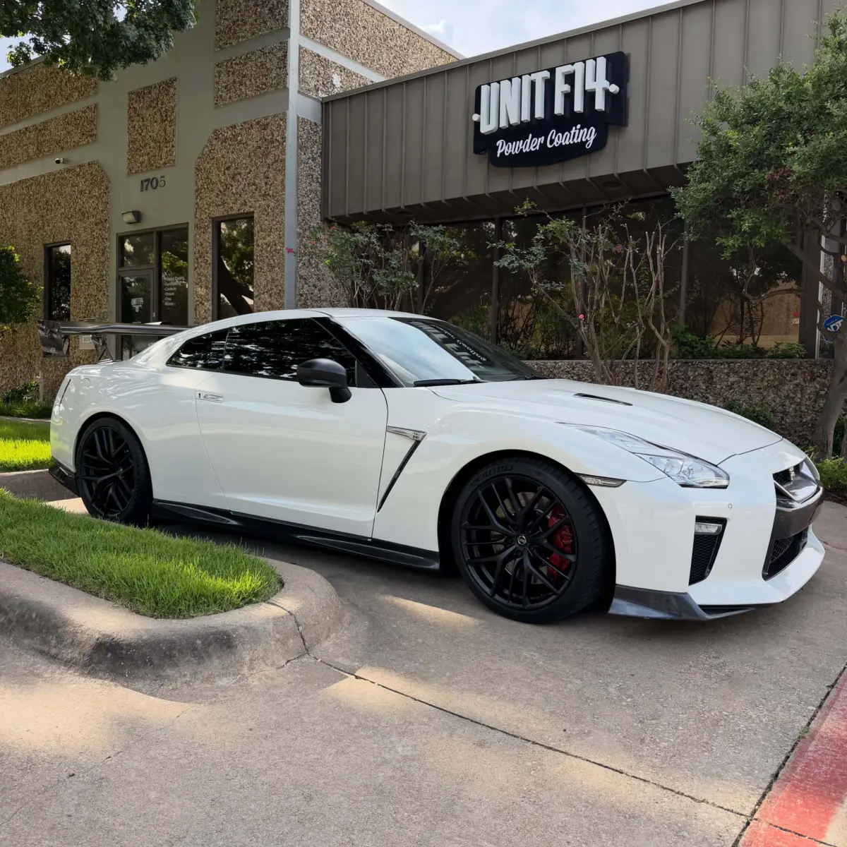 Nissan GTR wheels repaired and powder coated Denim Black