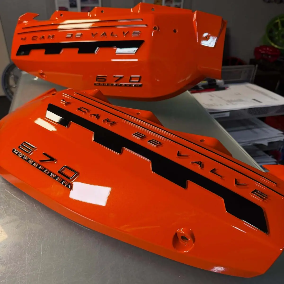 Metal C8 Corvette engine covers powder coated in @prismaticpowders Russet Orange with gloss black lettering and high gloss clear