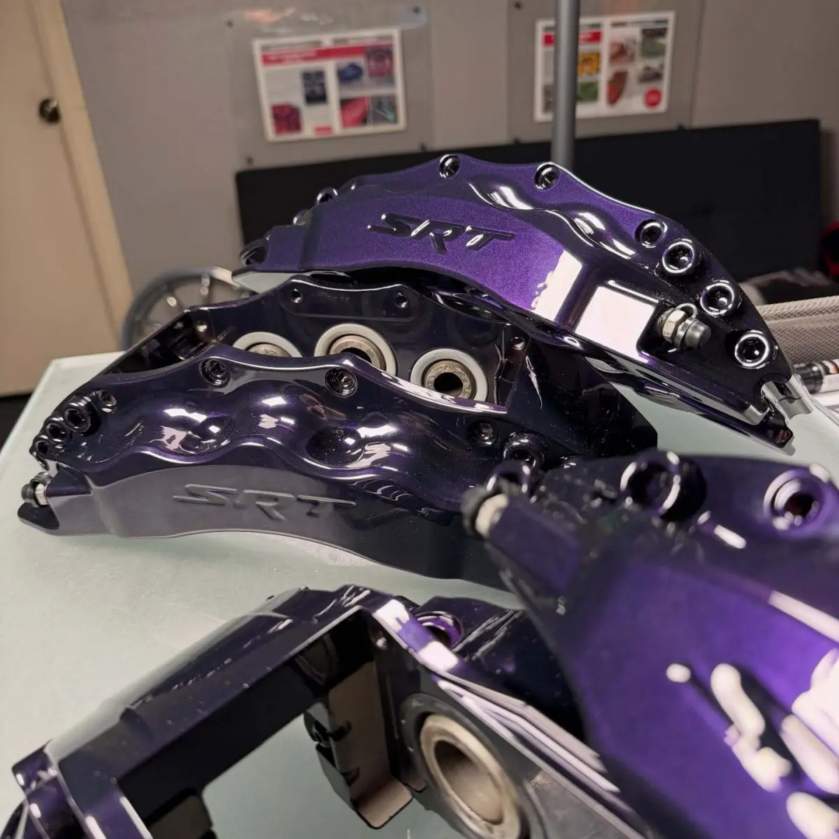 Dodge Viper brake calipers rebuilt and powder coated in Extreme Purple with High Gloss Clear