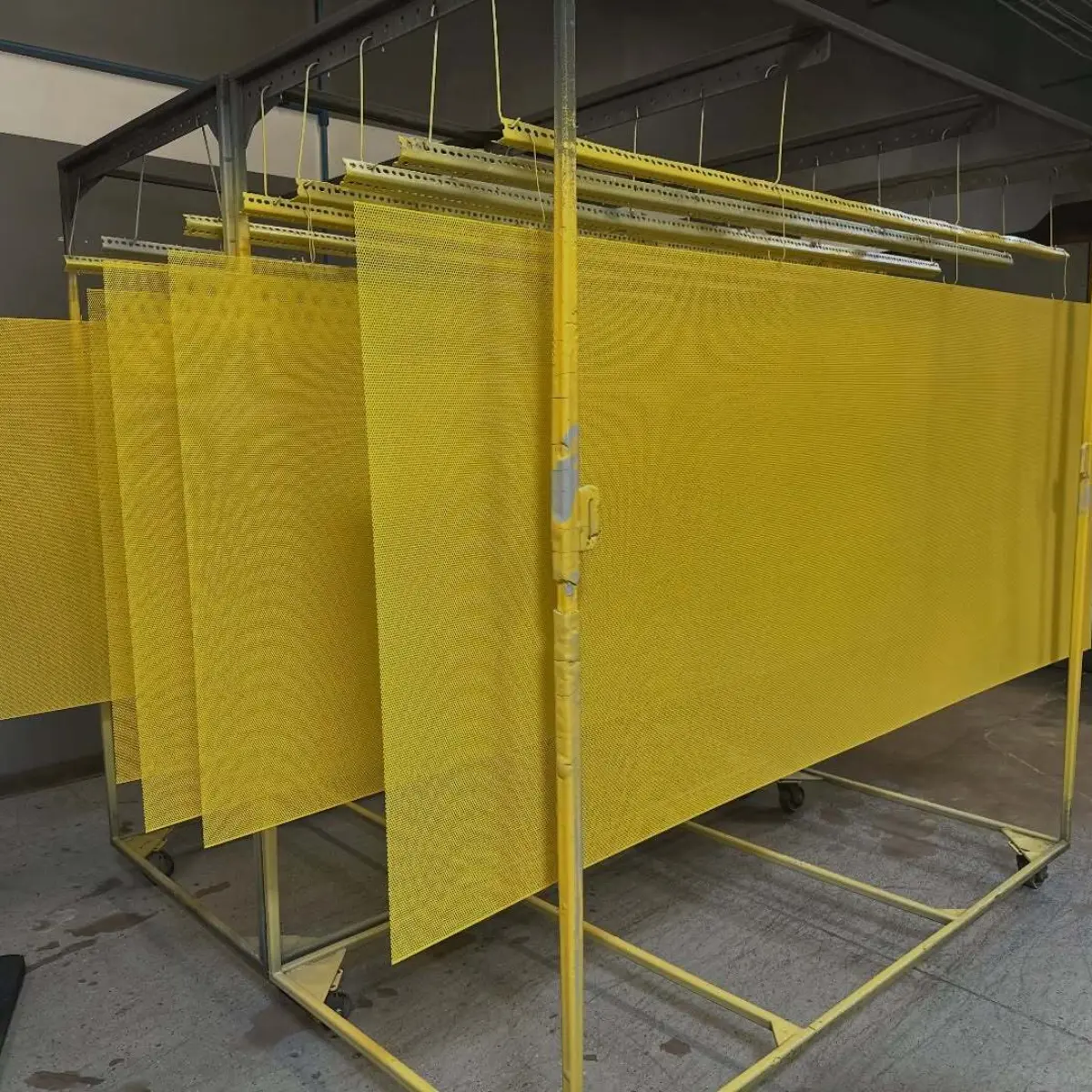 Aluminum perforated panels powder coated RAL 1018 Zinc Yellow for a local restaurant!