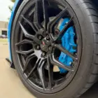 Color matched C8 Corvette brake calipers, powder coated in Chevy Rapid Blue with High Gloss Clear