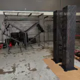 Desk and electronics storage towers sandblasted and powder coated with zinc primer and texture black