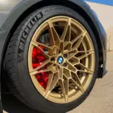 BMW M4 Competition wheels powder coated in Waltz Gold with High Gloss Clear