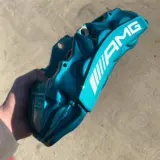 Mercedes AMG calipers refinished in Cortez Teal