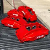 Audi R8 calipers rebuilt and refinished in @prismaticpowders Roadster Red