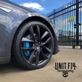 Tesla Model S wheels and brake calipers refinished in Denim Black and Powder Blue